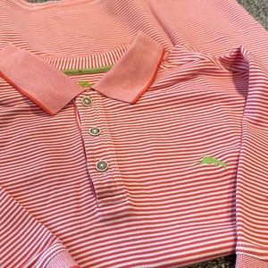 Tommy Bahama striped polo orangish coral with lime green detail